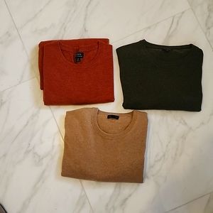 3 crewneck cashmere sweaters.